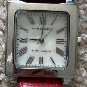 -Anne Klein ladies watch with stainless steel back water resistant leather strap